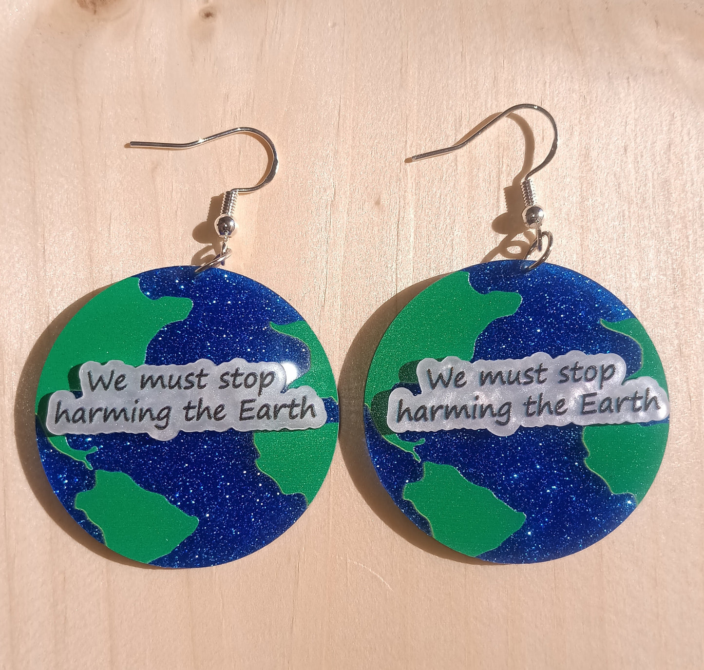 We must stop harming the Earth Earrings