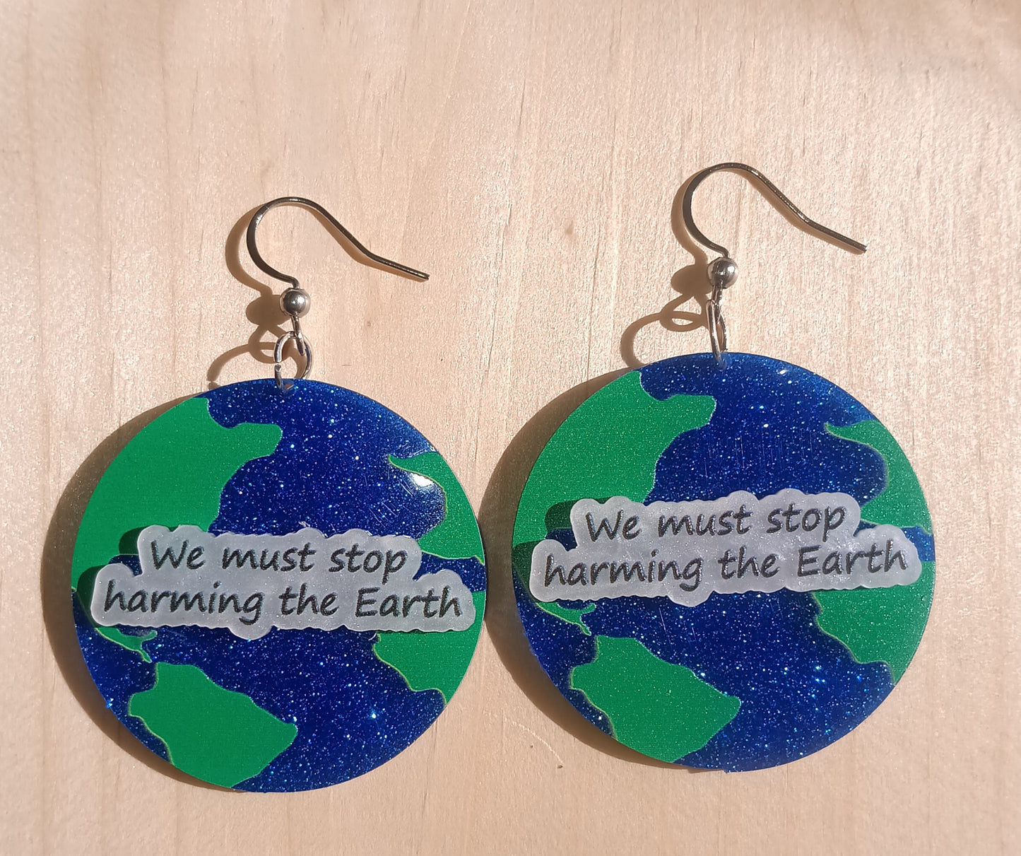 We must stop harming the Earth Earrings